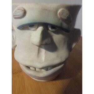 very well articulated ugly face pottery dimensionl signed handmade mug/jug